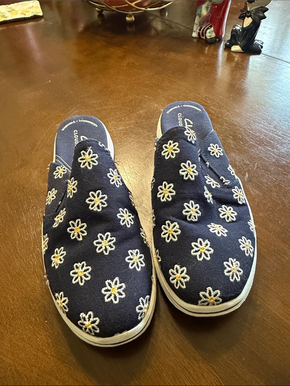 Clark’s Navy Slip-On Floral Sneakers, size 6.5.